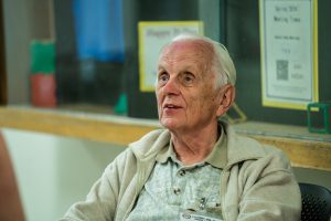 Ron Underwood at the 2019 California High School Speech Association State Championship, visiting with students and coaches and offering encouragement and support.